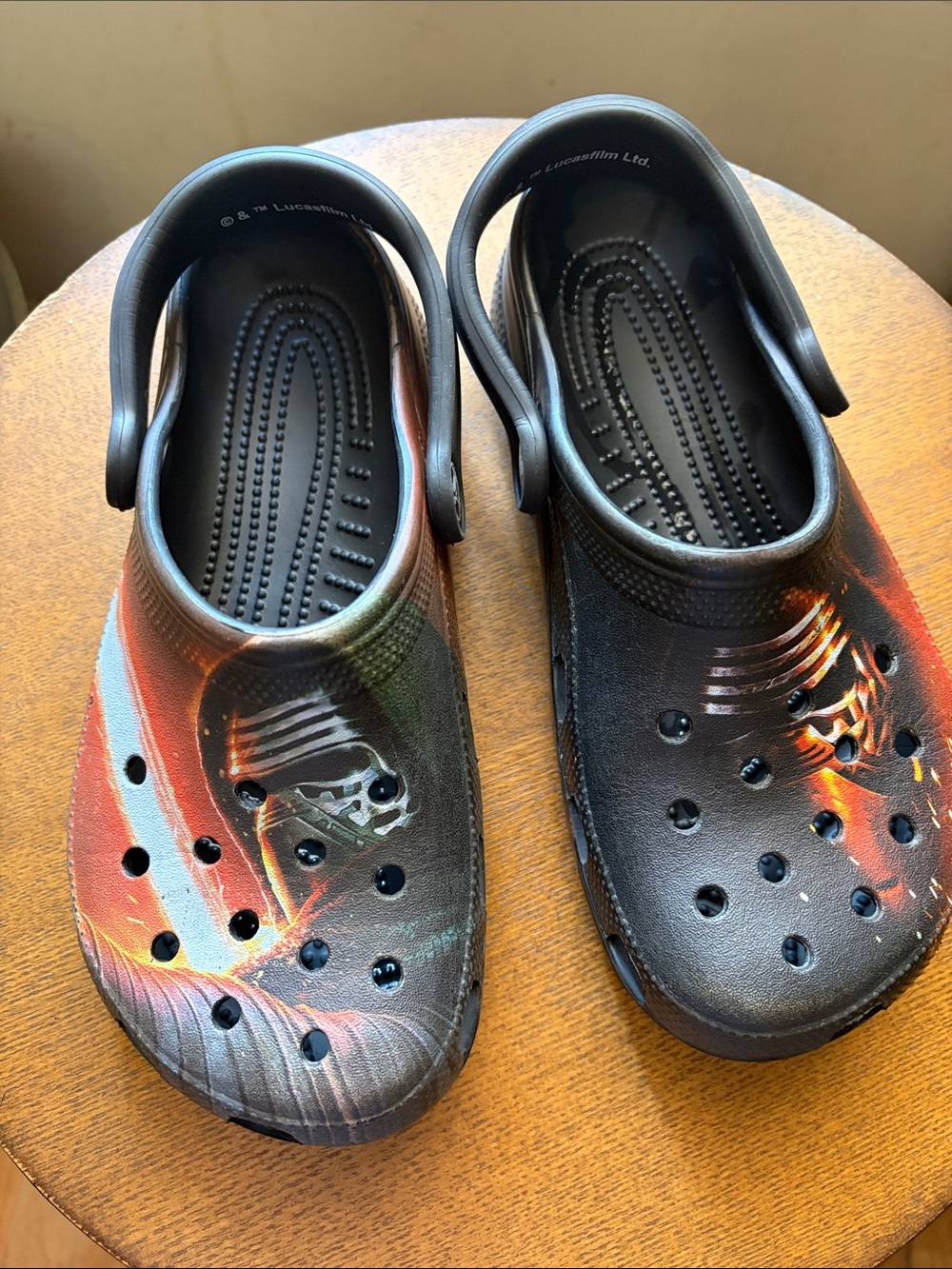 CROCS Kids Black Foam Clogs with Red & Orange Accent Graphic